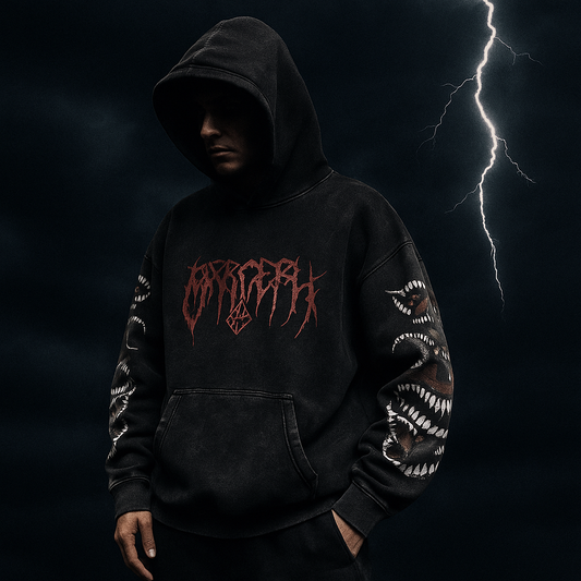 Person wearing a black hoodie with red text against a dark background with lightning.
